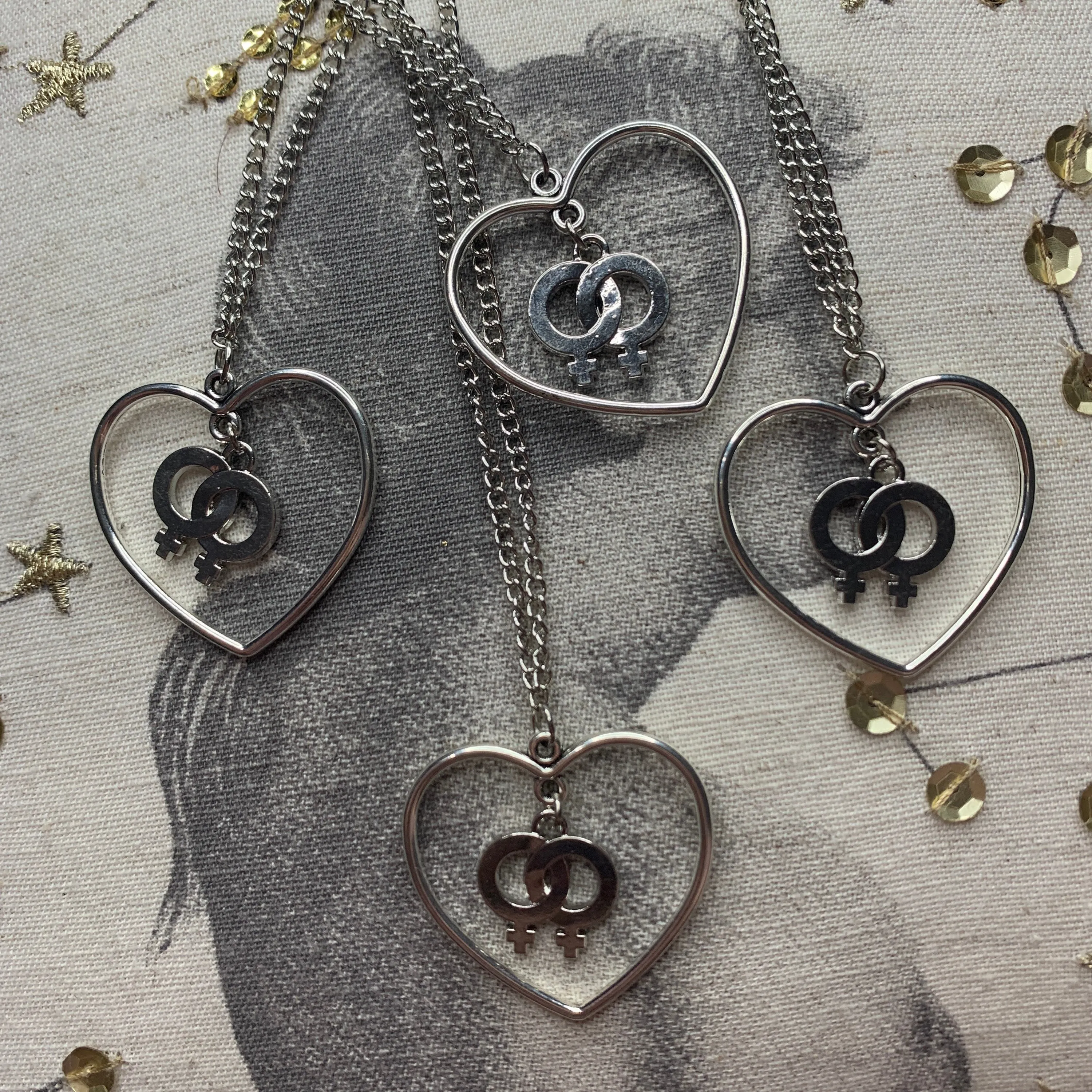 Double Venus/Female Sign in a Heart Necklace