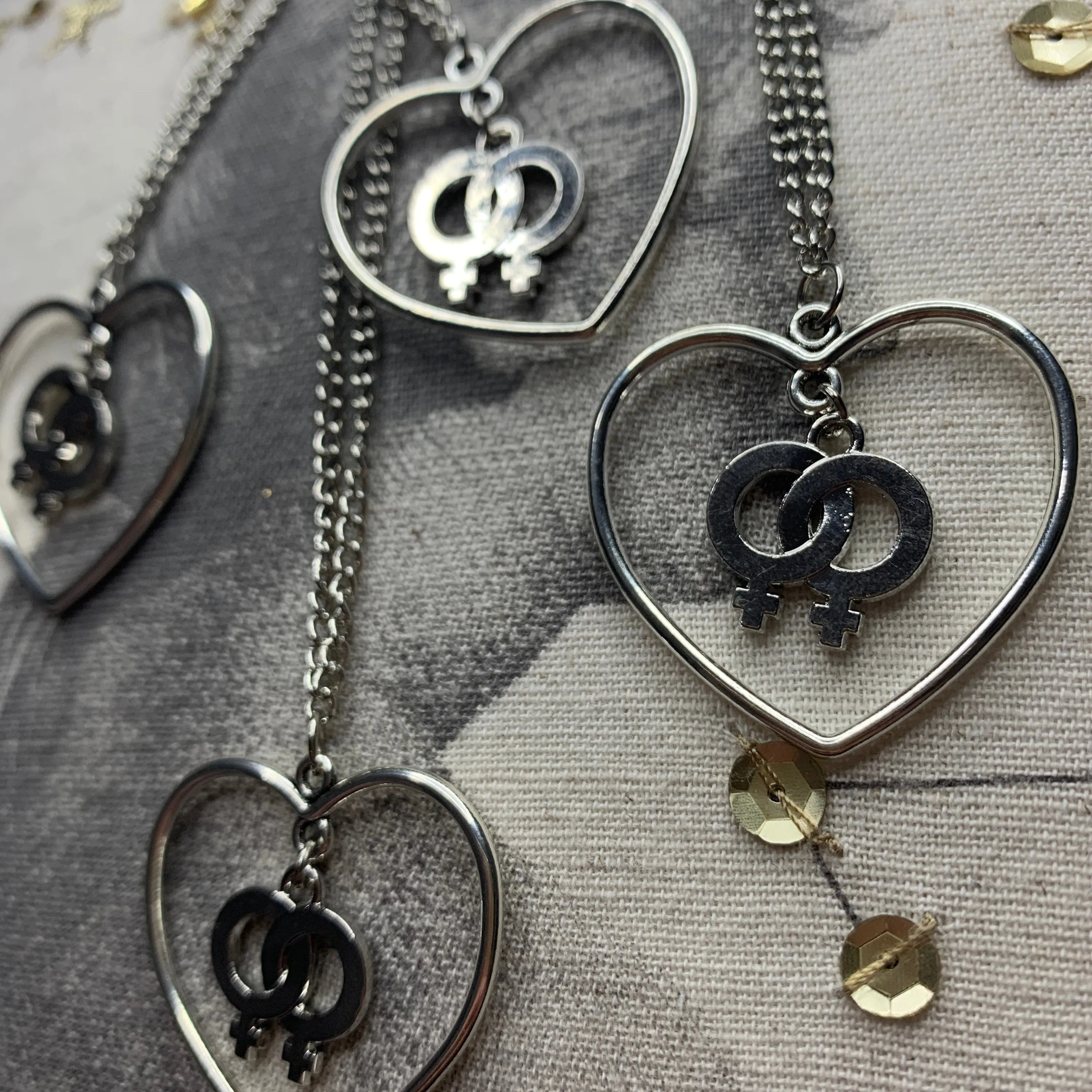 Double Venus/Female Sign in a Heart Necklace