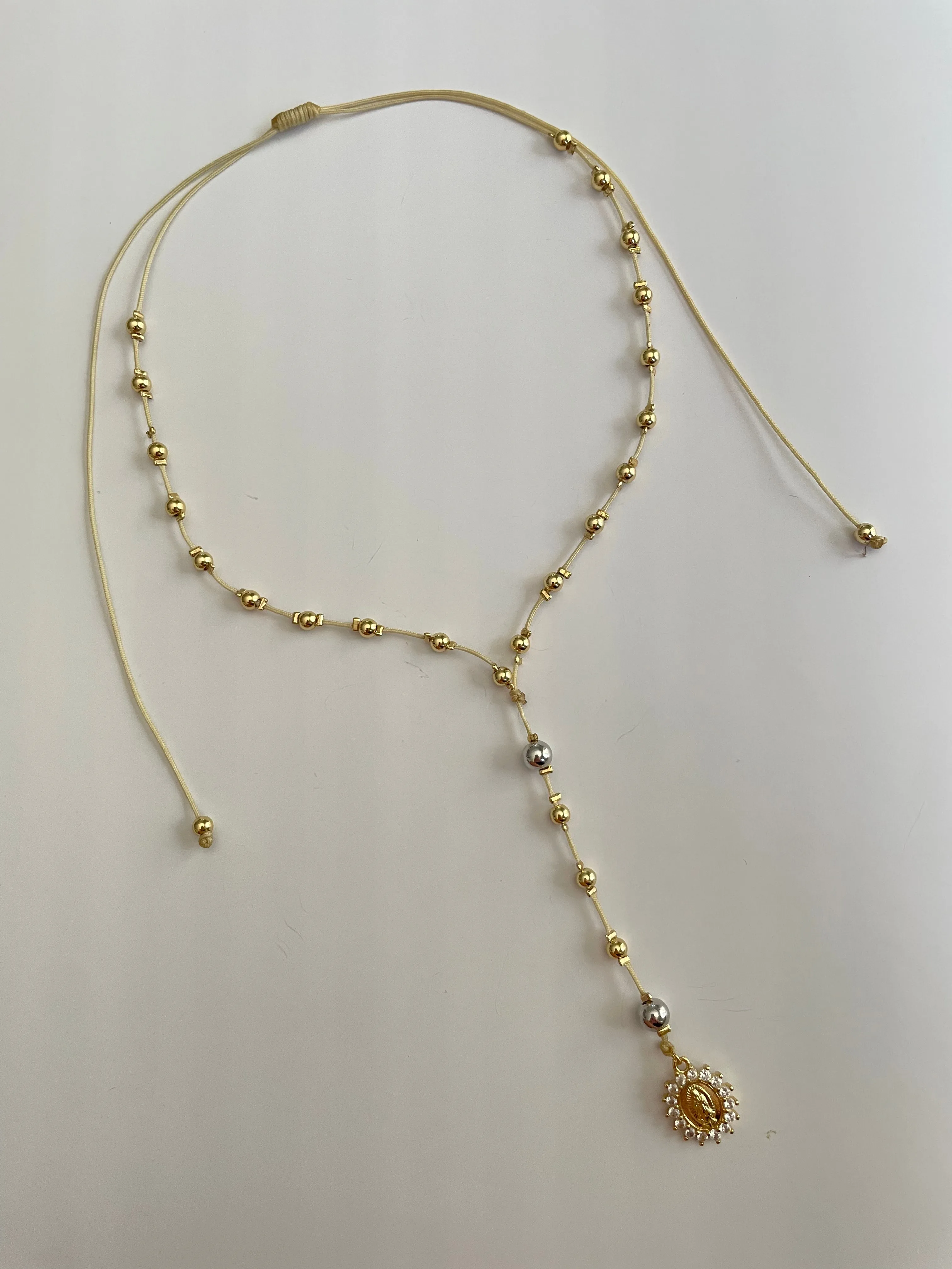 Gold beaded rosary