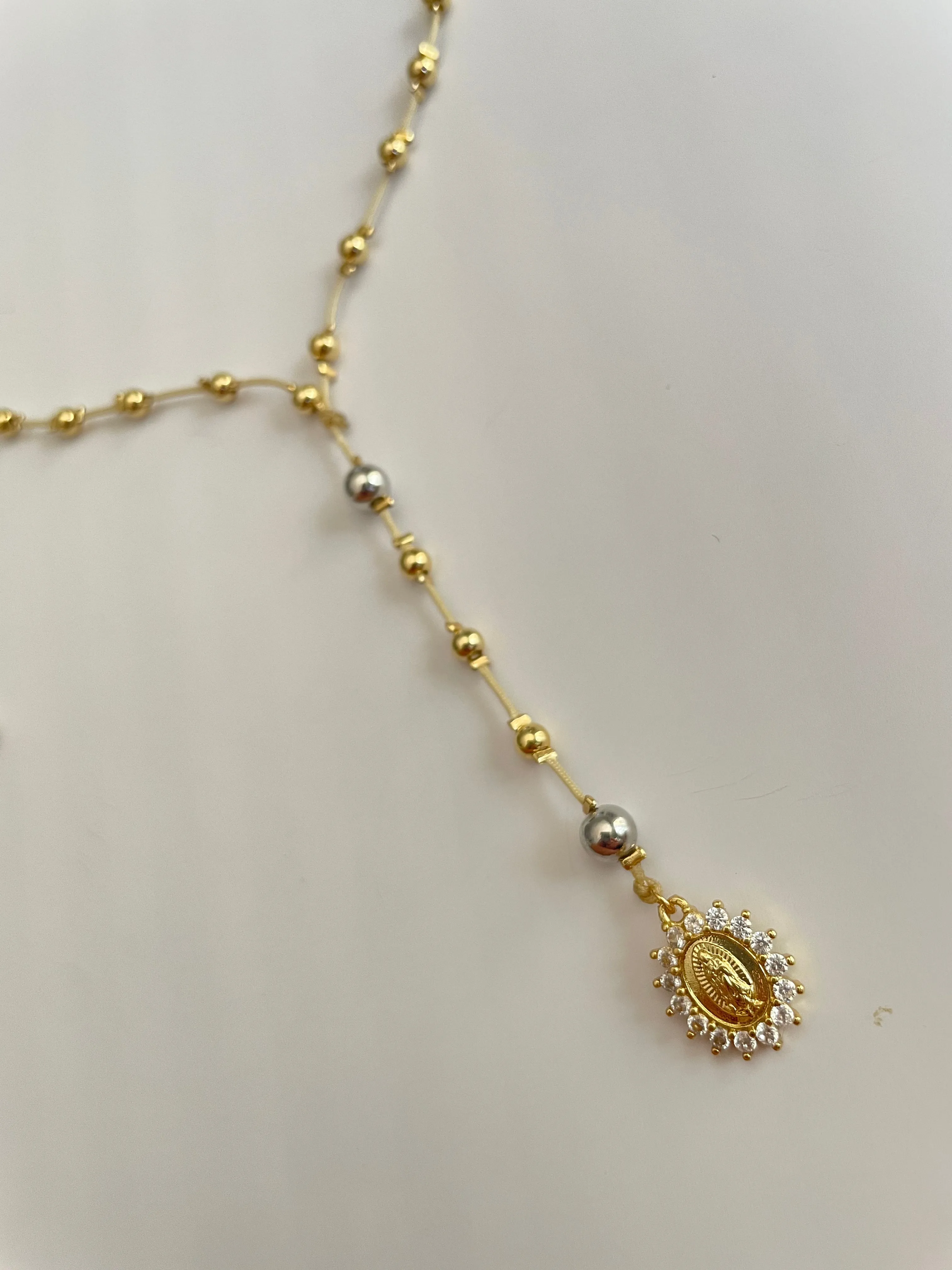 Gold beaded rosary