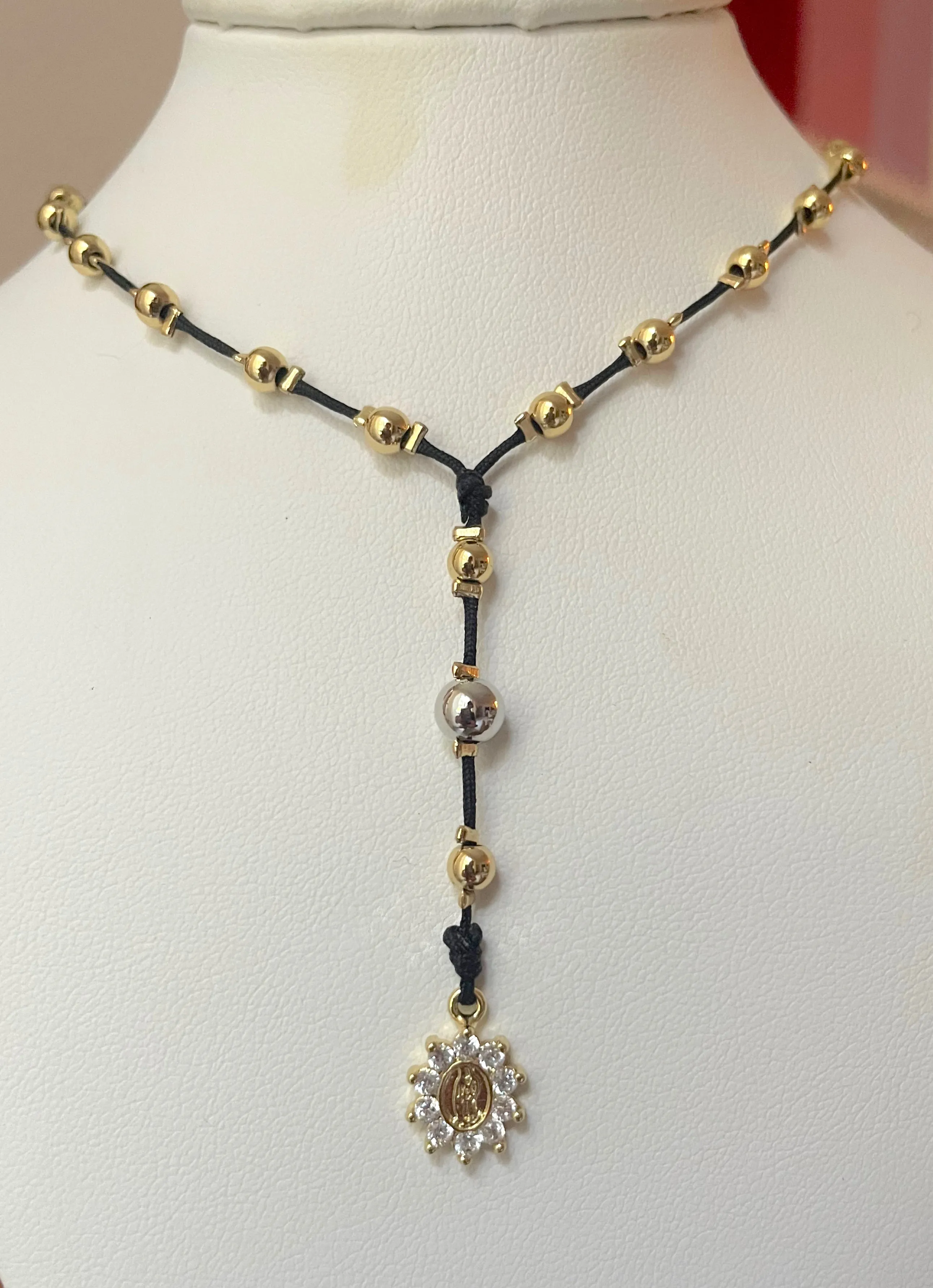 Gold beaded rosary