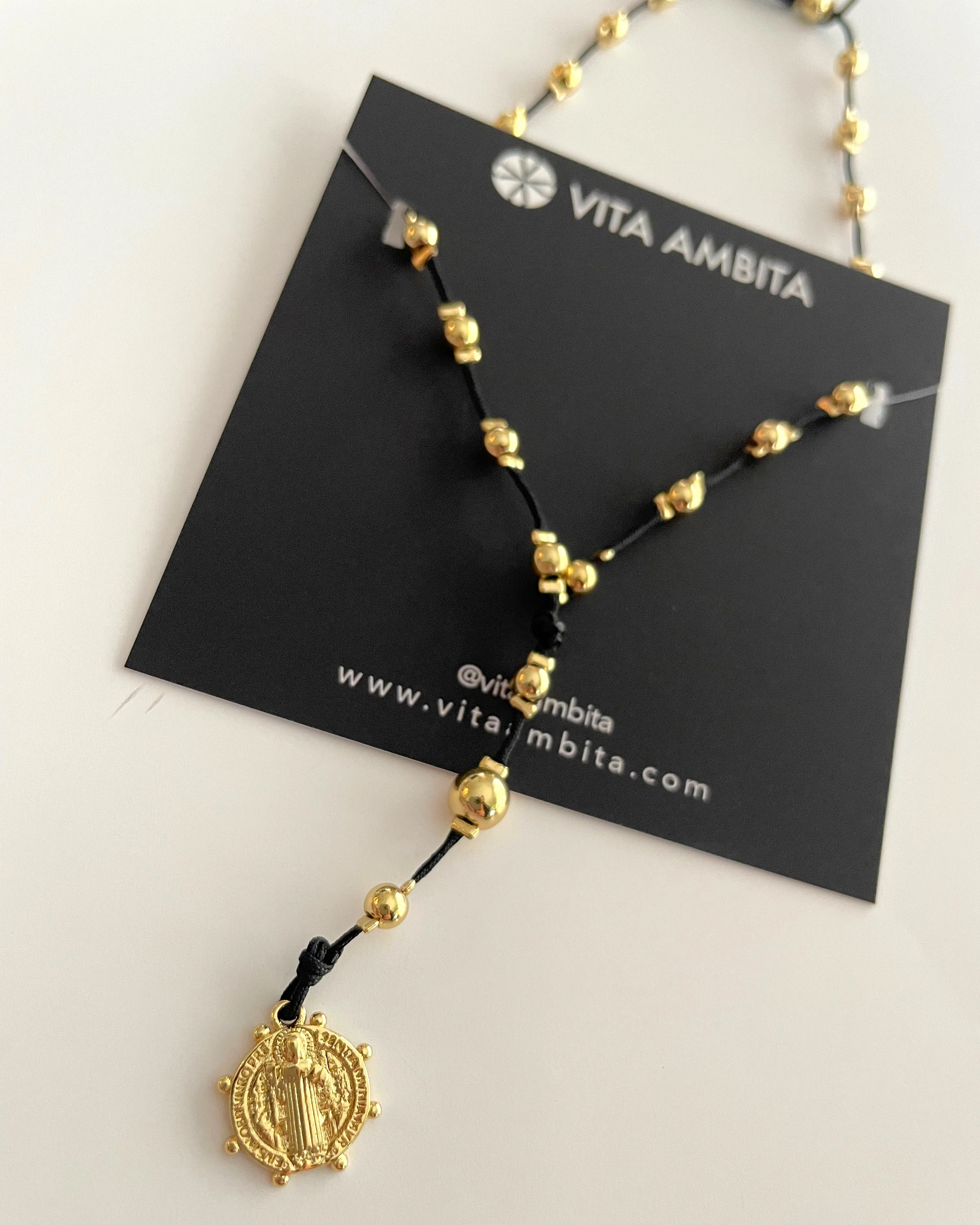 Gold beaded rosary