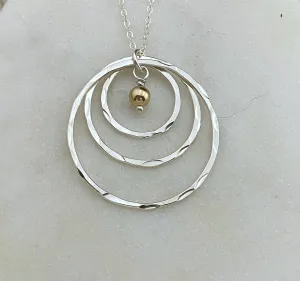 Sterling silver forged hoop necklace with gold-fill bead