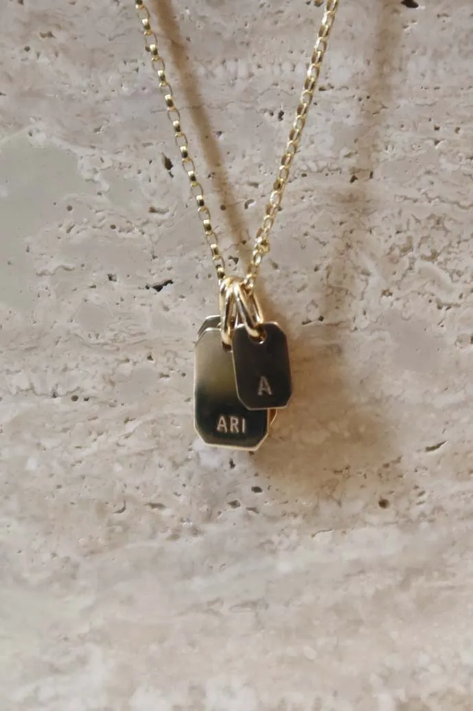 THE LOVE TAG LETTER GOLD PENDANT