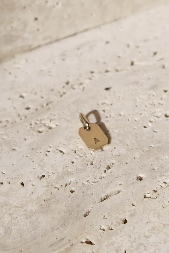 THE LOVE TAG LETTER GOLD PENDANT